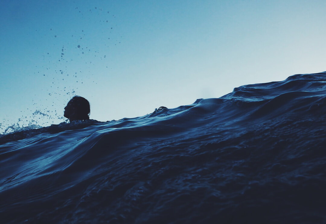 Girl Swimming in Ocean